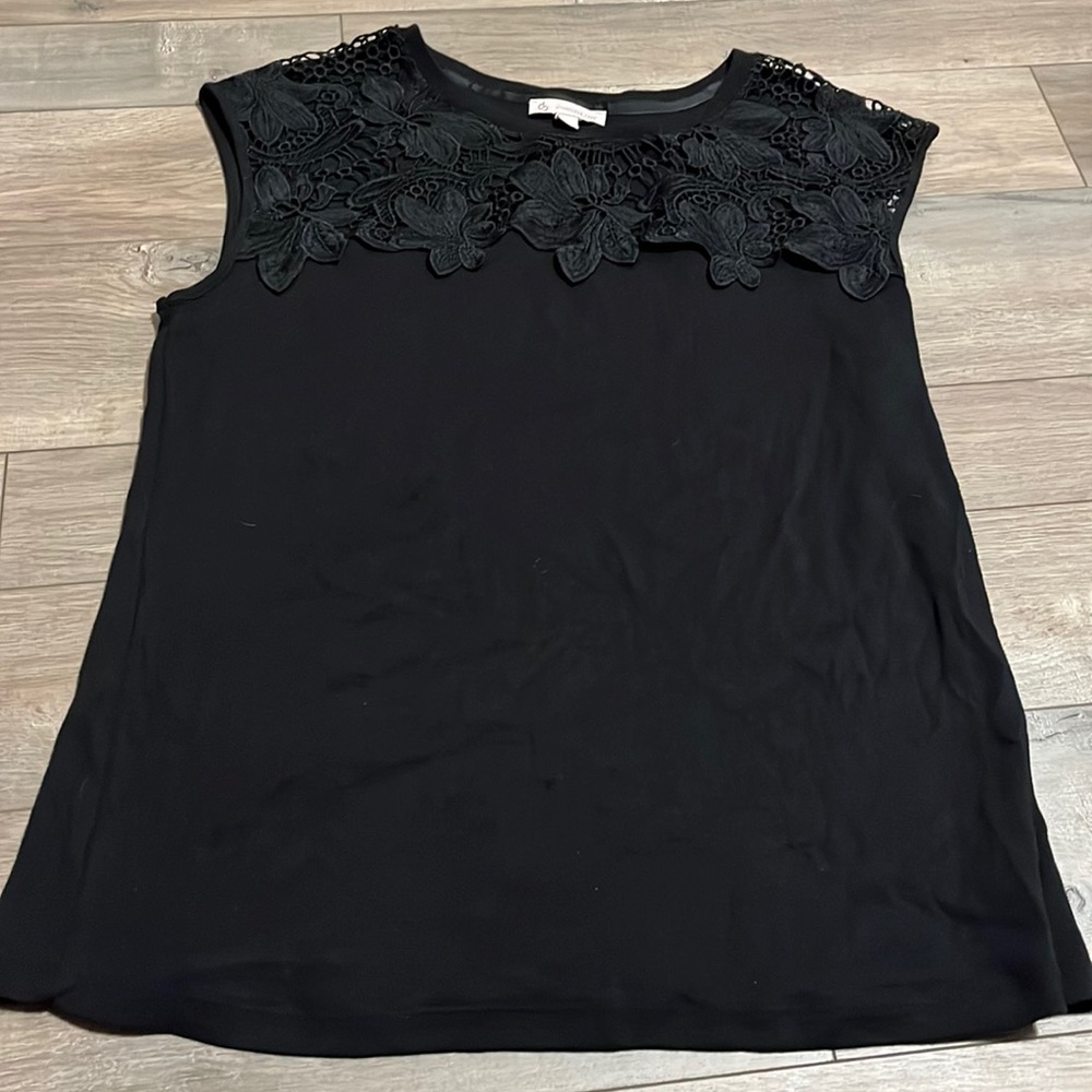 black top with knit floral detail